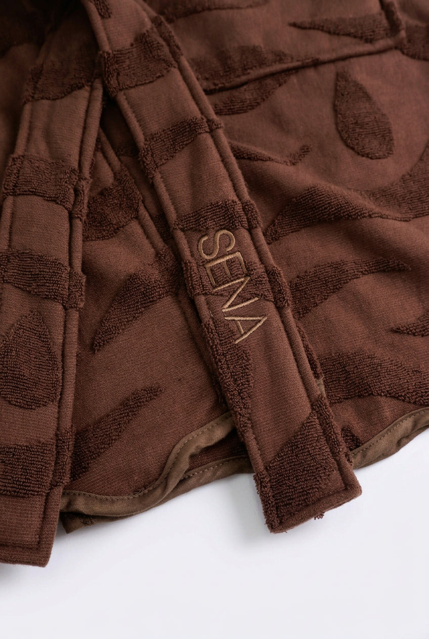 SENA embroidered belt detail on the cotton sauna robe